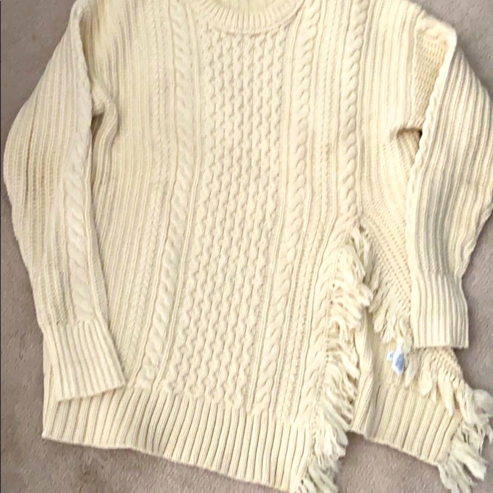 J Crew ivory cableknit sweater w/fringe detail.